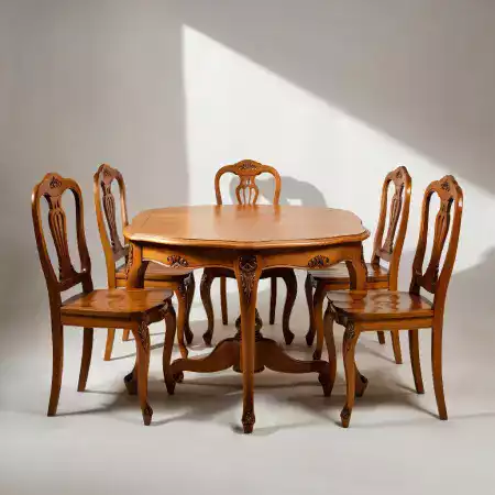 Custom commissioned sheesham furniture piece with client family crest carved in center designed specifically for customer room measurements